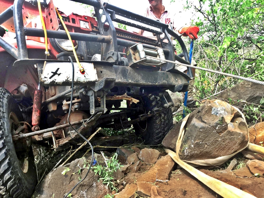 Off-road car climbing rocks