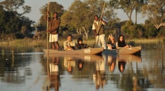People in mekoro in Botswana