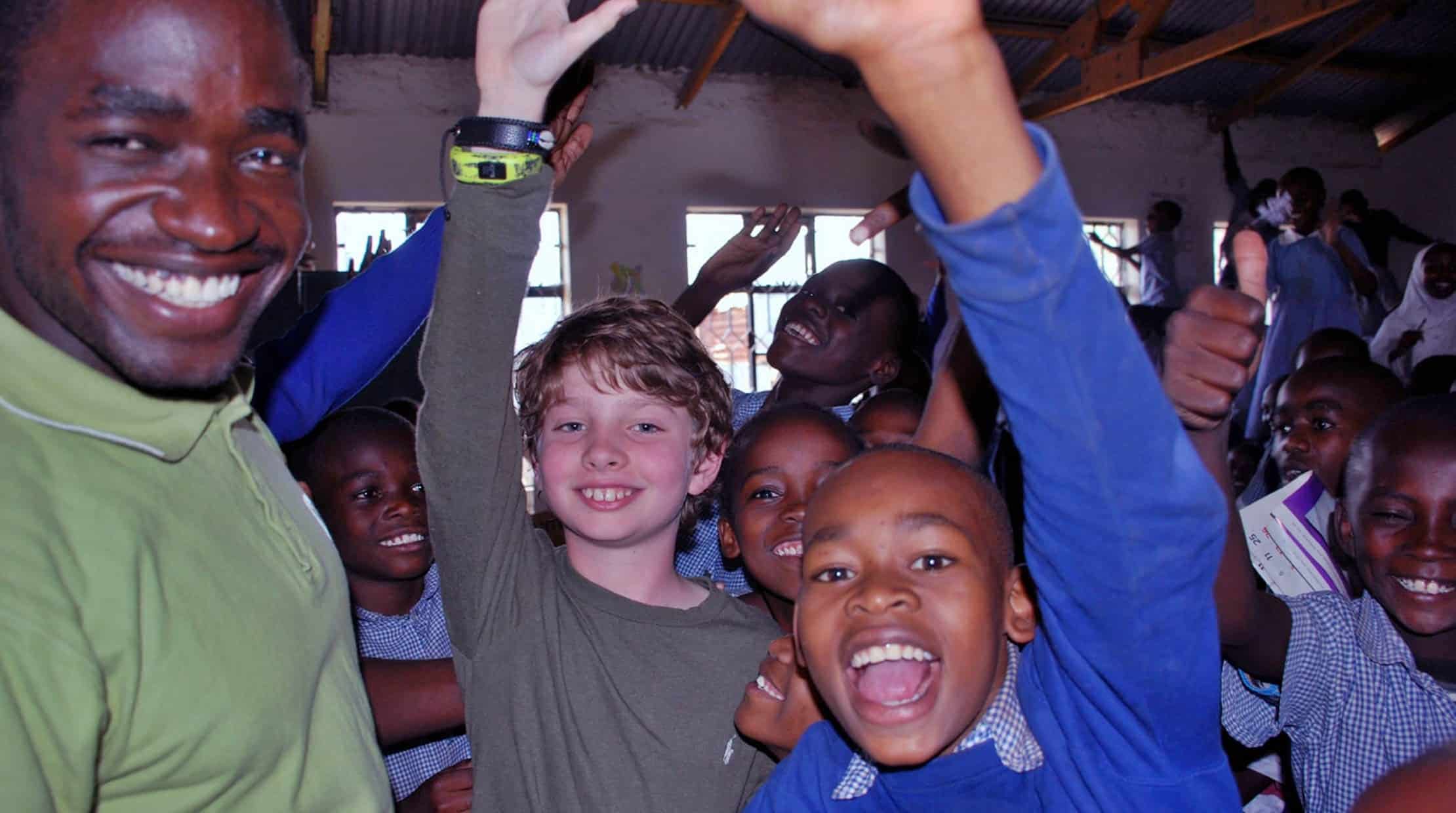 Jack with School Kids in Kenya