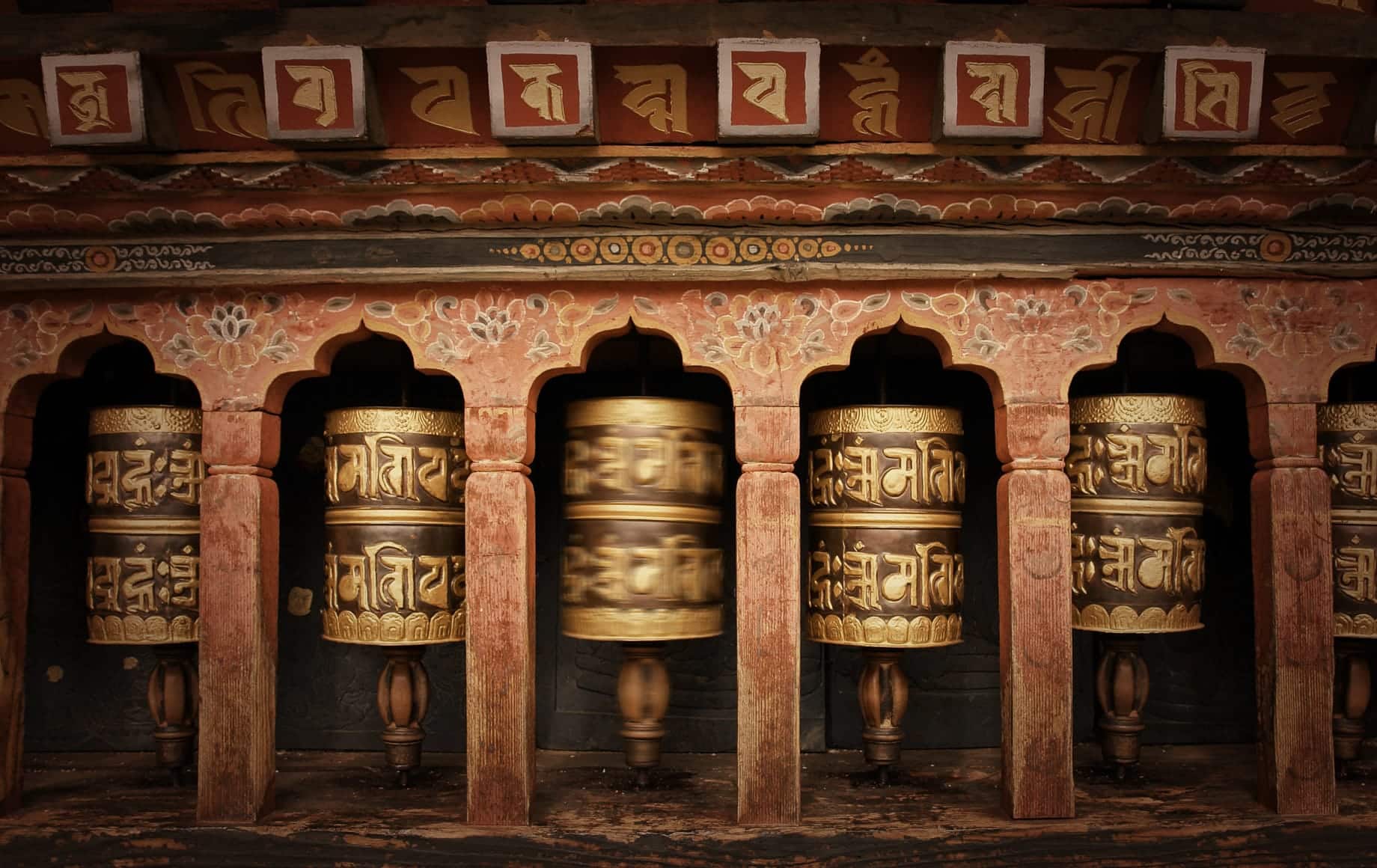 Bhutan copper prayer wheel in traditional monastery