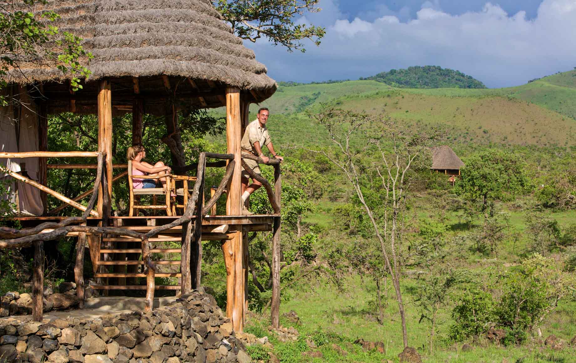 Looking out to a sunny, green day at the patio in Chyulu Hills in Africa