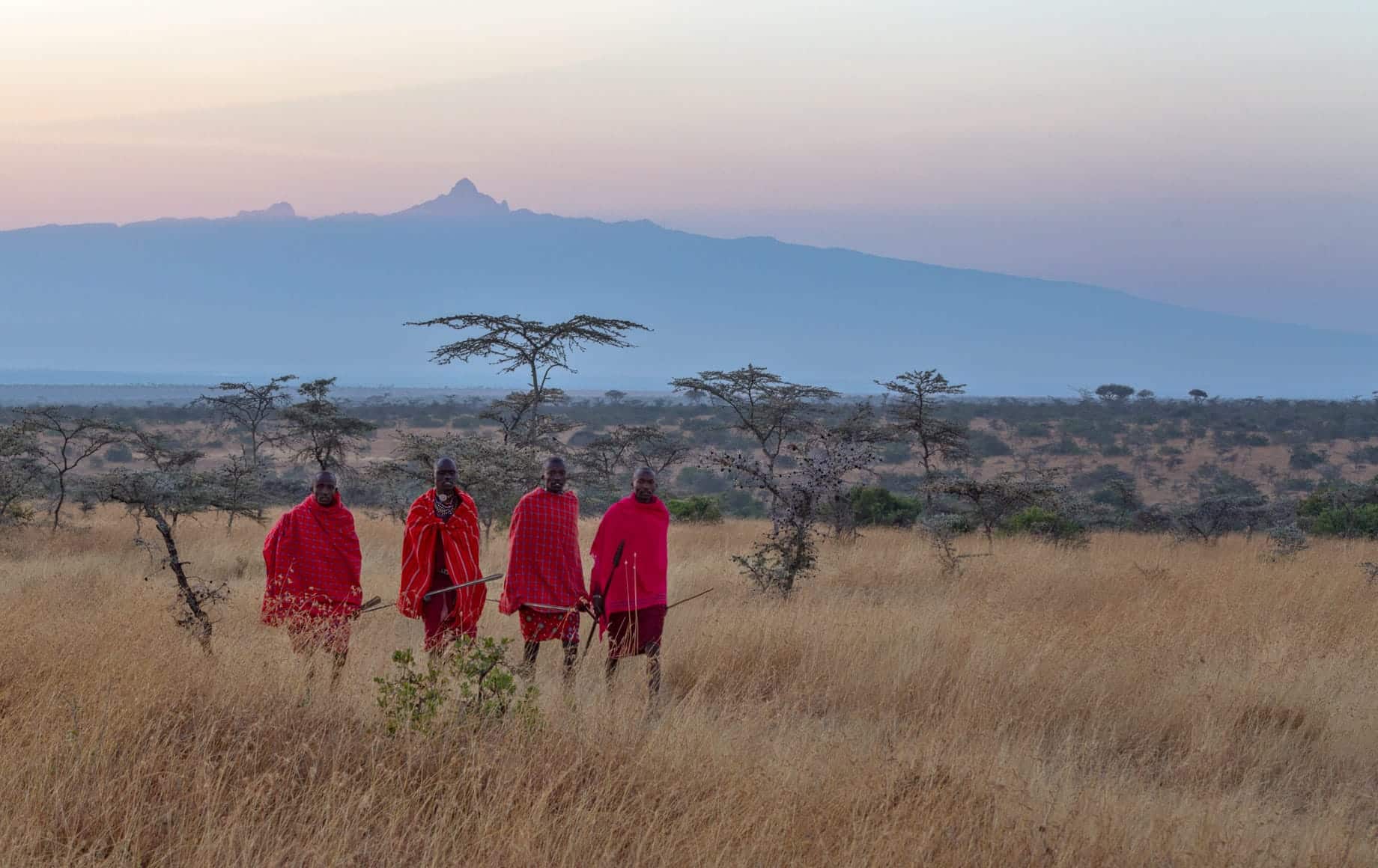 Men strolling at Laikipia Plateau African Safari