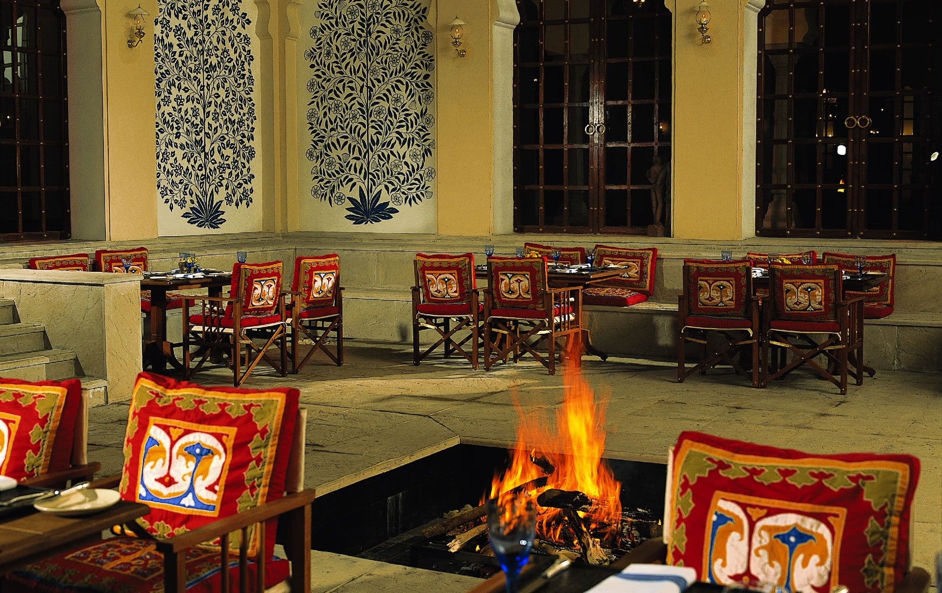 a dining room with a fire pit