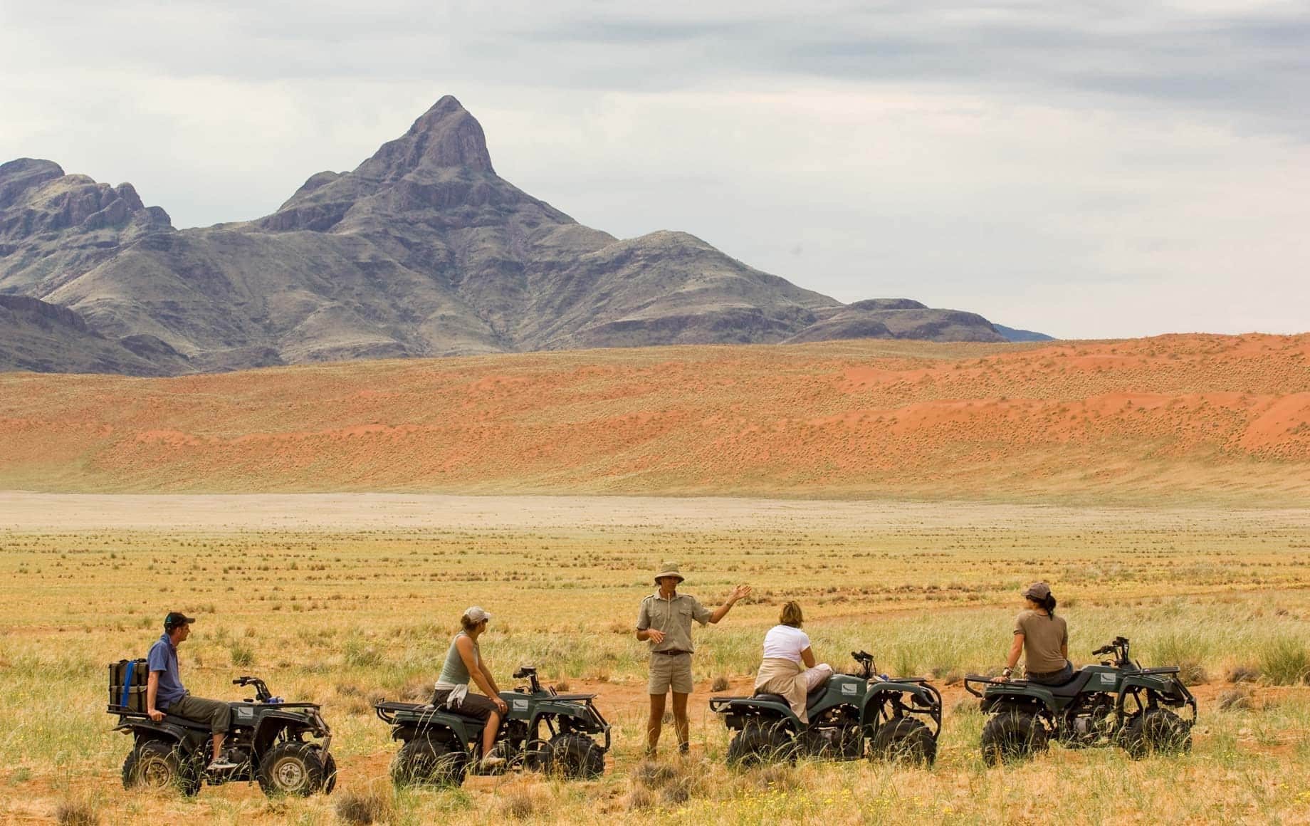 Tourists traveling across Sossusvlei Namib Desert