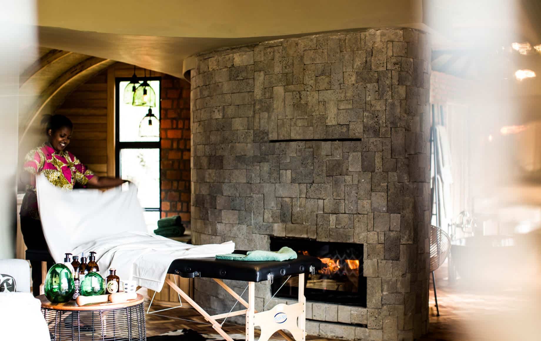 Warm and comforting massage service at Bisate Lodge in Africa
