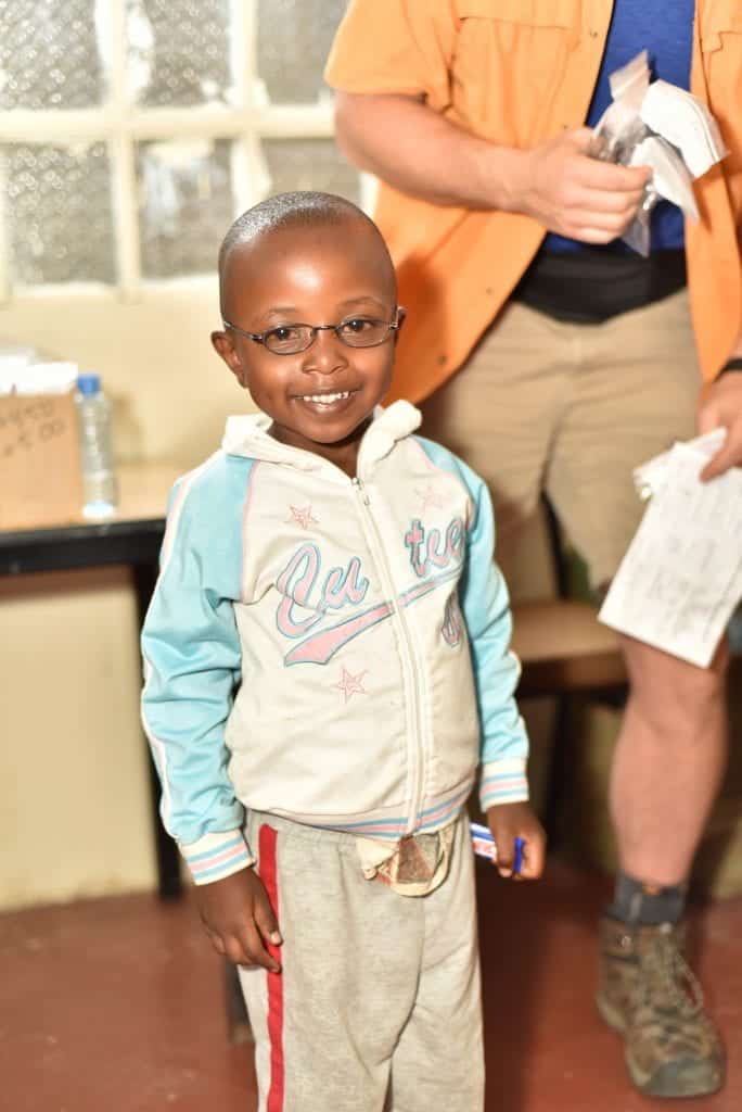 A child wearing their new glasses