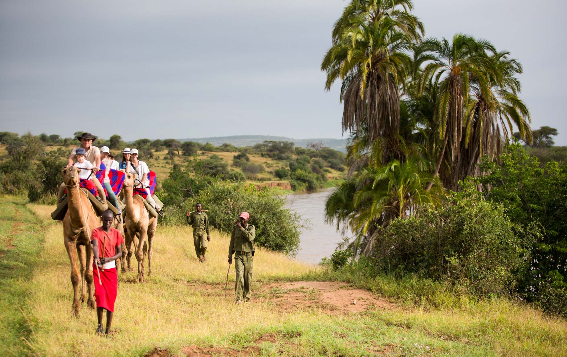 Guides and locals on horseback in Loisaba Conservancy