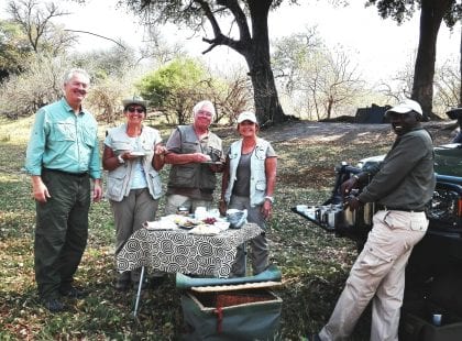 People getting ready for a makeshift dinner