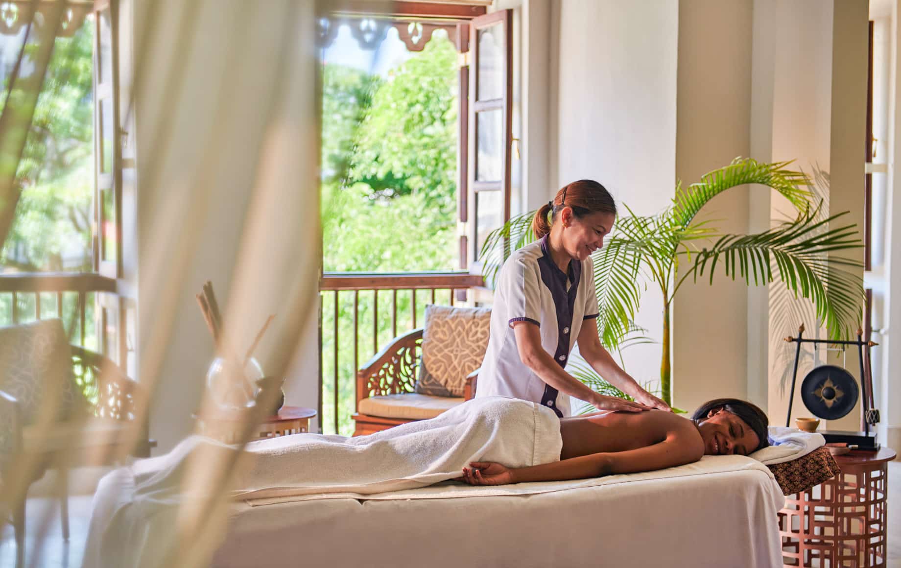 Woman gets massage at Park Hyatt, Zanzibar