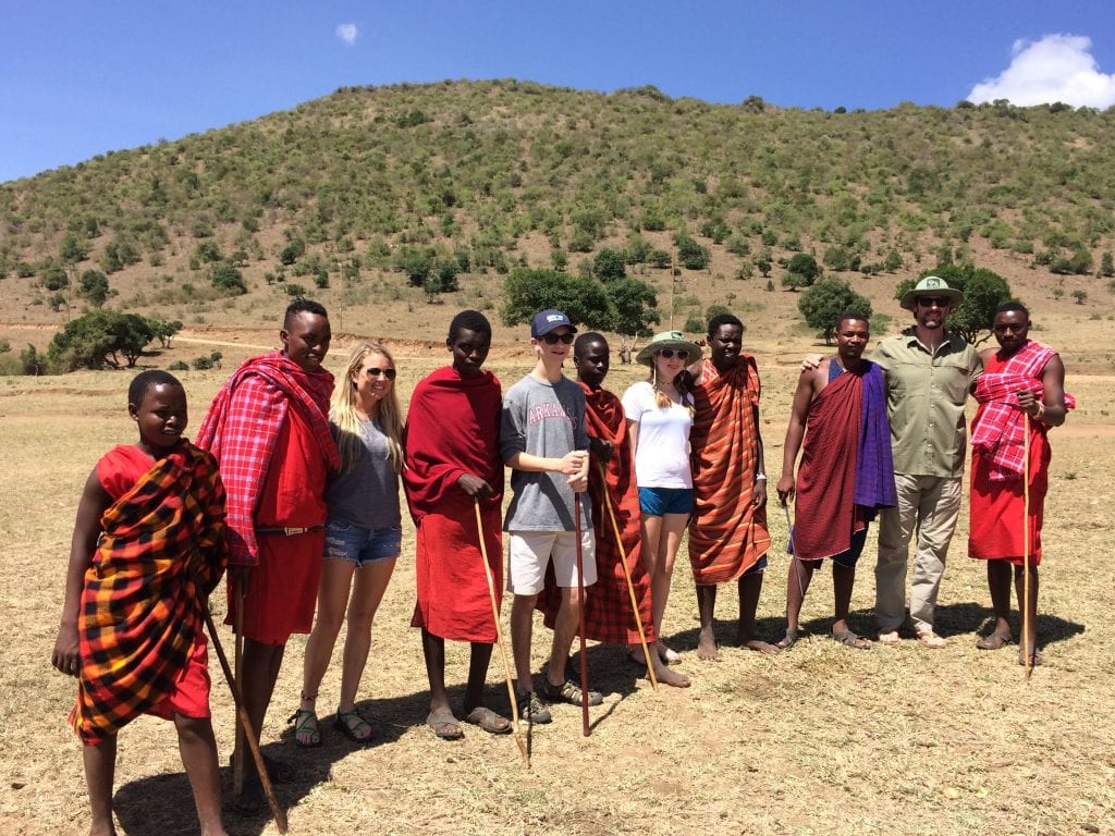 Maasai tribe with a family on safari