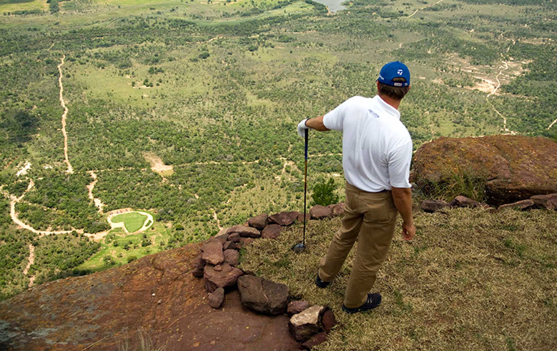 A man playing golf.