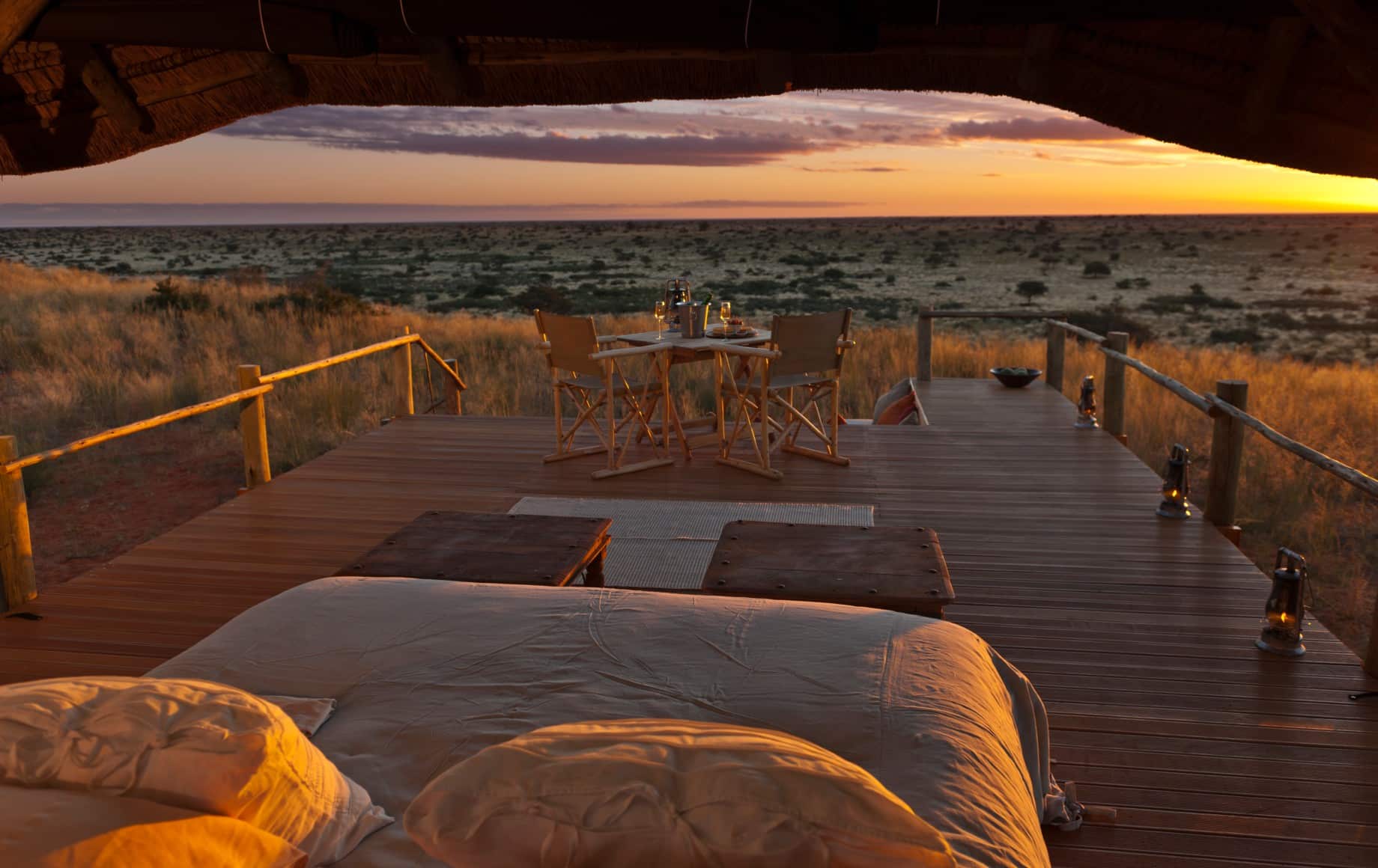 bed overlooking the savannah at sundown