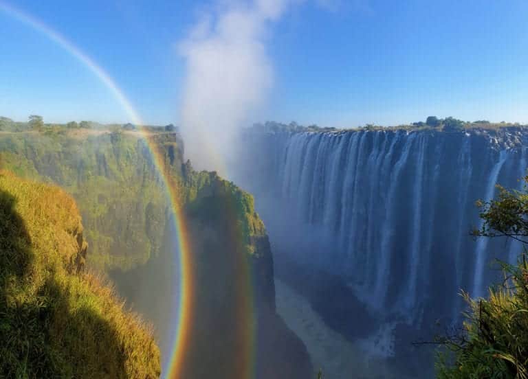 a rainbow at Victoria Falls