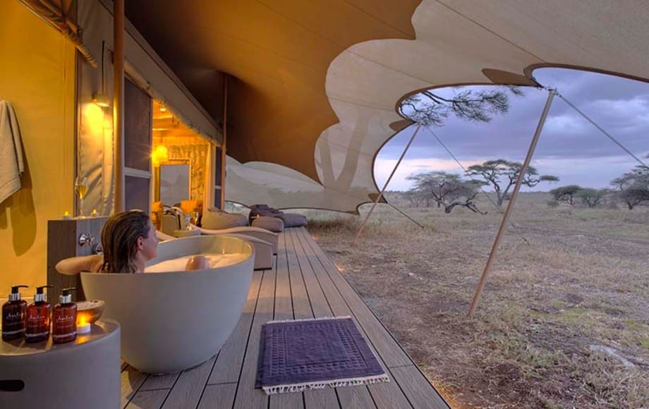 A deck outside a hotel room in Namiri Plains