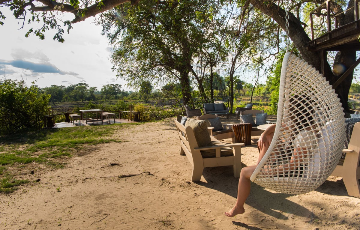 Woman in Hanging Chair