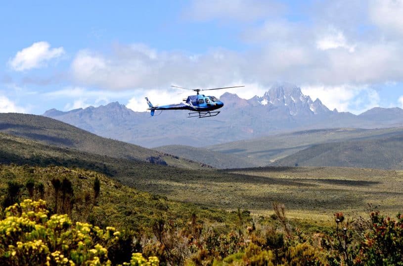 A helicopter over plains.